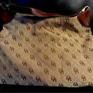 Dooney & Bourke large signature tan shoulder bag.